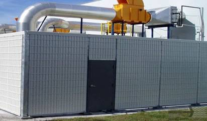 An aluminum soundproofing sound barrier enclosing power generators.